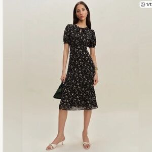 Reformation Delia Dress in Lucien. Brand NWT tags,  never worn.